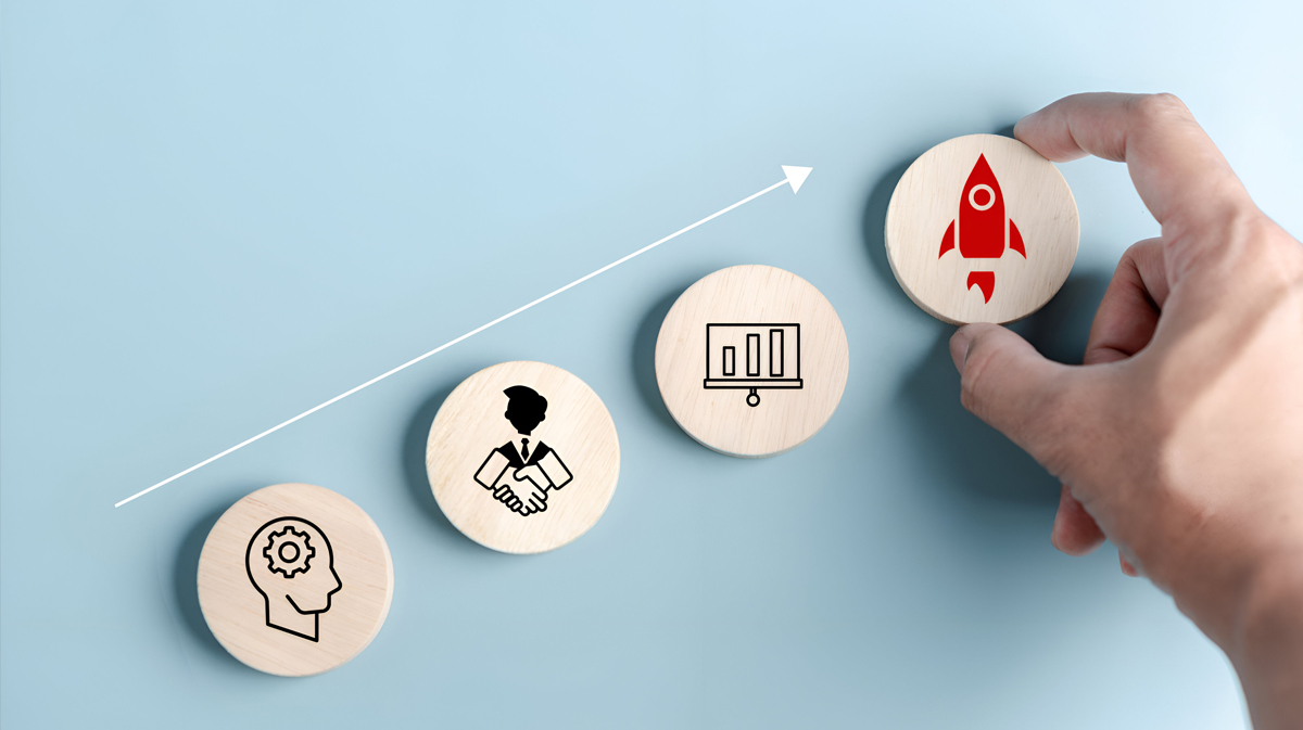 Creative workspace with post-it notes on strategy and brand identity concepts.